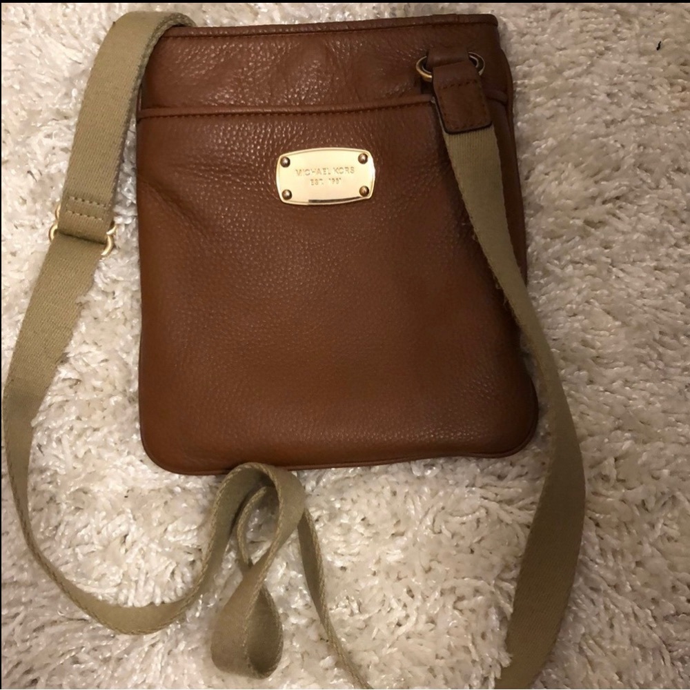 Michael Kors cognac crossbody purse with canvas adjustable strap